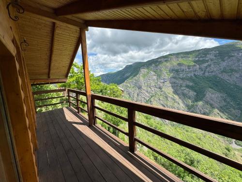a view from the balcony of a cabin with a view at Harsnadzor Eco Resort in Halidzor