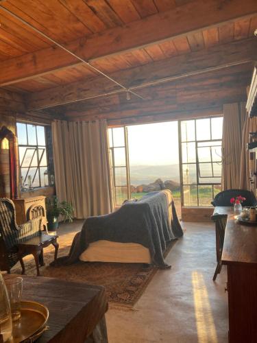 Χώρος καθιστικού στο Rose Mountain Cottage