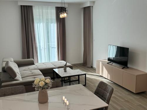 TV a/nebo společenská místnost v ubytování K apartments