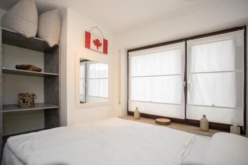 Кровать или кровати в номере Appartement - Am Bergelchen 22 Winterberg-Niedersfeld Touch of Canada