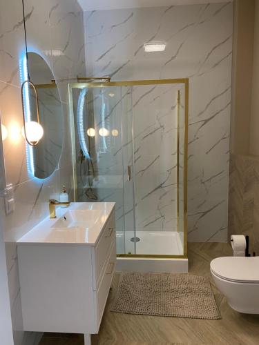 Ένα μπάνιο στο Apartament Kościuszki