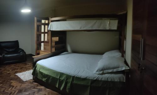Postel nebo postele na pokoji v ubytování Akany fanantenana