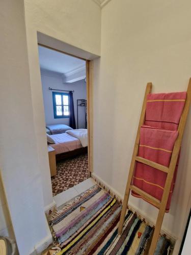 a room being remodeled with a ladder at Dar Randigaba in Taroudant