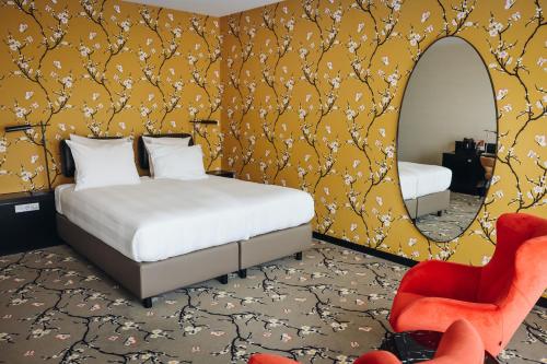 Posteľ alebo postele v izbe v ubytovaní Van der Valk hotel Harderwijk