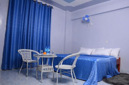 Postel nebo postele na pokoji v ubytování Summer Oasis