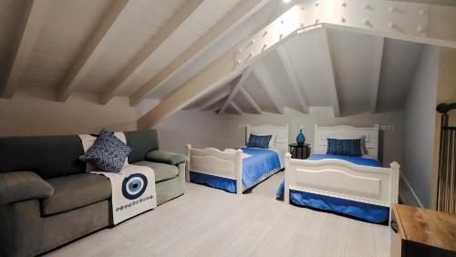 Ένα ή περισσότερα κρεβάτια σε δωμάτιο στο Linos House