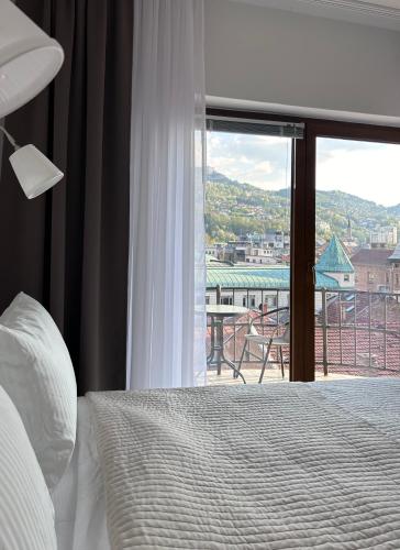 Llit o llits en una habitació de Apartments Diva