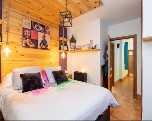 Postel nebo postele na pokoji v ubytování Casita del Barranco lunar