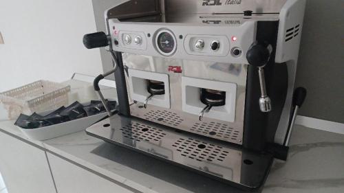 Kemudahan buat kopi dan teh di B&B Le perle fg