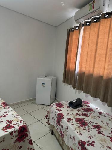 Кровать или кровати в номере Pousada Bella Vista