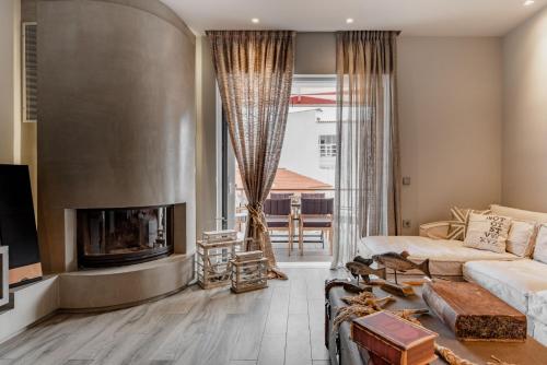 Ένα ή περισσότερα κρεβάτια σε δωμάτιο στο Tyros Boutique Houses Villas