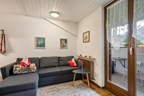 a living room with a couch and a table at Elisabeth in Lana