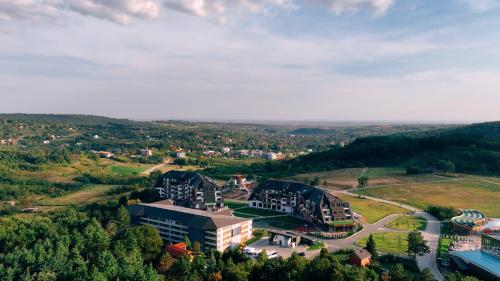 an aerial view of a city with buildings at Fruške Residences in Vrdnik