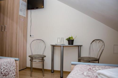 Postel nebo postele na pokoji v ubytování Hotel Pas Katina