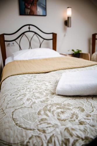 Postel nebo postele na pokoji v ubytování Hotel Pas Katina