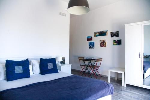 Postel nebo postele na pokoji v ubytování vento di mare