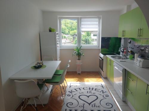 Η κουζίνα ή μικρή κουζίνα στο Apartman Stil