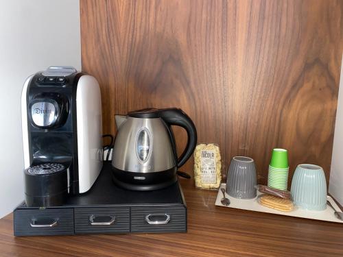 a coffee maker sitting on top of a counter at Nonno Nicola Rooms in Bari