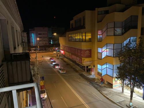 an overhead view of a city street at night at Central Apartament in Bîrlad