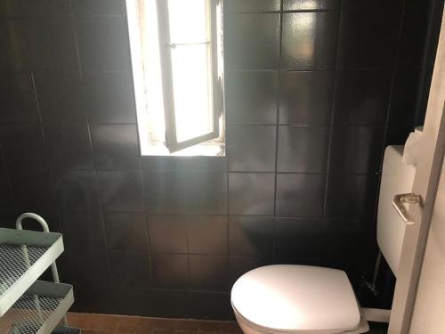 Ванная комната в Lakeside Studio – Haus mit Seezugang