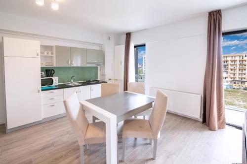 Η κουζίνα ή μικρή κουζίνα στο Miramare Residence Aparthotel