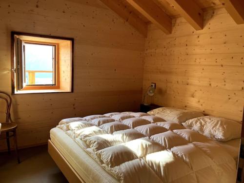 Tempat tidur dalam kamar di Le mayen de François