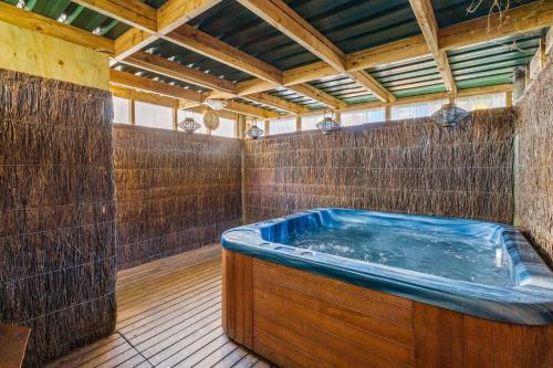 a large jacuzzi tub in a room at Tasman Holiday Parks - Christchurch in Christchurch