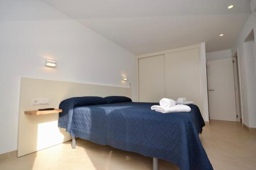 Ένα ή περισσότερα κρεβάτια σε δωμάτιο στο Villa Esmeralda