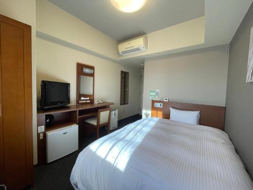 Televisyen dan/atau pusat hiburan di Hotel Route-Inn Misawa