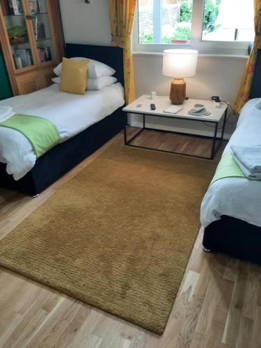 Ένα ή περισσότερα κρεβάτια σε δωμάτιο στο Another Room