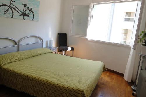 Postel nebo postele na pokoji v ubytování PortAventura y Ferrari Land, Apart con piscina