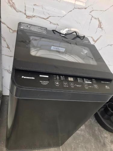 a black router sitting on top of a counter at JA TRANSIENT HOUSE in General Santos