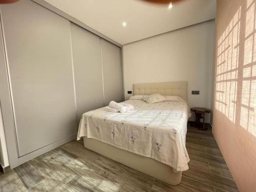 Katil atau katil-katil dalam bilik di Céntrico Apartmento