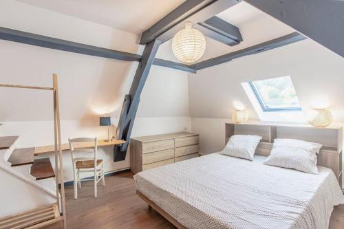Posteľ alebo postele v izbe v ubytovaní L'Elégante - maison de ville avec jardin