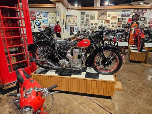 a group of motorcycles on display in a store at Luxurious 7-Bedroom Home in Solihull, close to NEC & BHX in Solihull