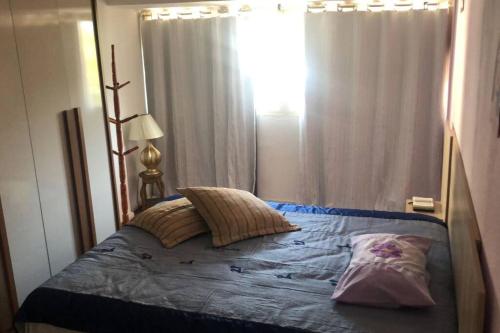 En eller flere senge i et værelse på Vista para o Parque Moscoso