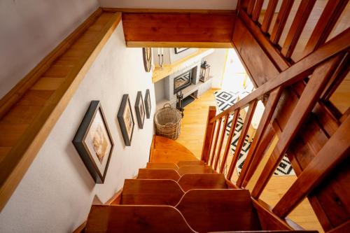 an overhead view of a staircase in a house at Cerdacul din Livada in Vaideeni