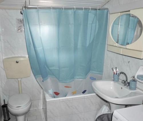 Ванная комната в Apartment Near the Sea