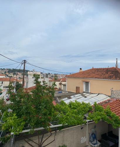 a view of a city from the roof of a building at Ambelos Skala in Mytilini
