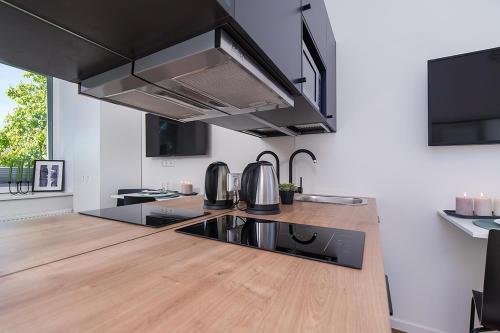 Η κουζίνα ή μικρή κουζίνα στο Laki 24 Apartments by EasyRentals