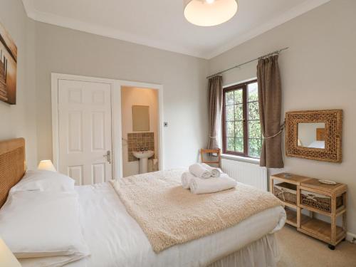 Ένα ή περισσότερα κρεβάτια σε δωμάτιο στο Brantfell Lodge