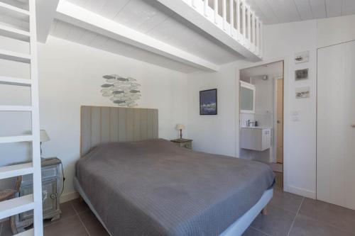 Ένα ή περισσότερα κρεβάτια σε δωμάτιο στο Maison familiale la Noue