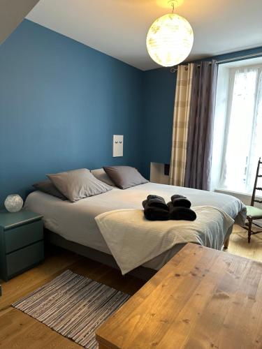 Ένα ή περισσότερα κρεβάτια σε δωμάτιο στο Comme à la Maison - Terrasse