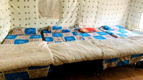 מיטה או מיטות בחדר ב-Gurgaon Paradise Resort Tapovan, Rishikesh