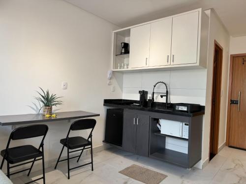 Una cocina o cocineta en PERFEIÇÃO do Cabo Branco - FLAT a 4 minutos da Praia
