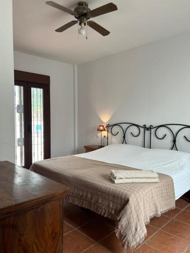 En eller flere senger på et rom på Casa Del Molino