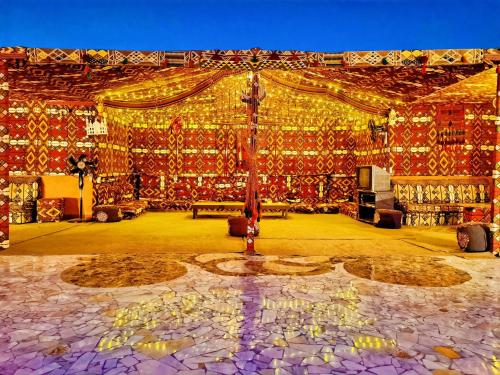 a large room with a large ceiling with colorful tiles at Energy Of Pyramid Hotel in Cairo