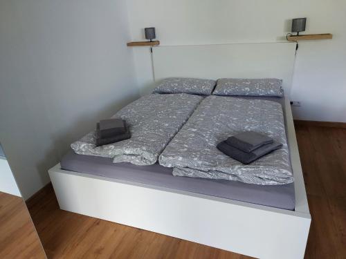 Ένα ή περισσότερα κρεβάτια σε δωμάτιο στο Ferienwohnung Moselliebe
