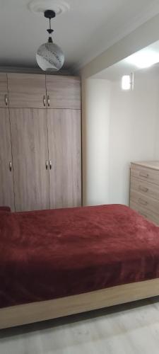 Giường trong phòng chung tại Apartment in Batumi