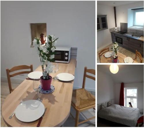 une cuisine et une salle à manger avec une table et des assiettes. dans l'établissement Gites Repère des Fées, à Pleugueneuc